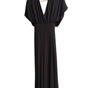 White House Black Market jumpsuit in black can be dressed up or down size 10